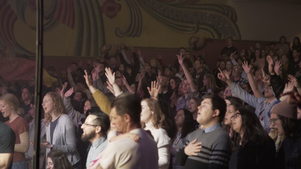 A church congregation worshiping together on a Sunday morning